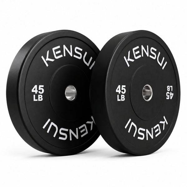 Pair of Kensui 45 lb black rubber bumper plates with white weight markings and steel center inserts, photographed on white.