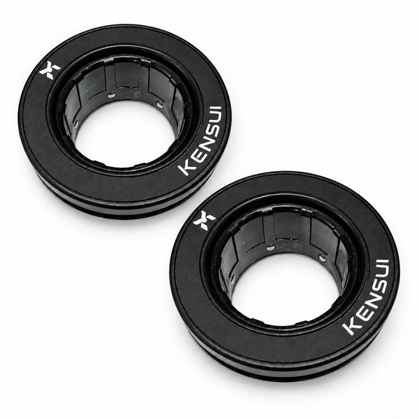 Pair of black Kensui auto-lock Olympic barbell collars with white branding