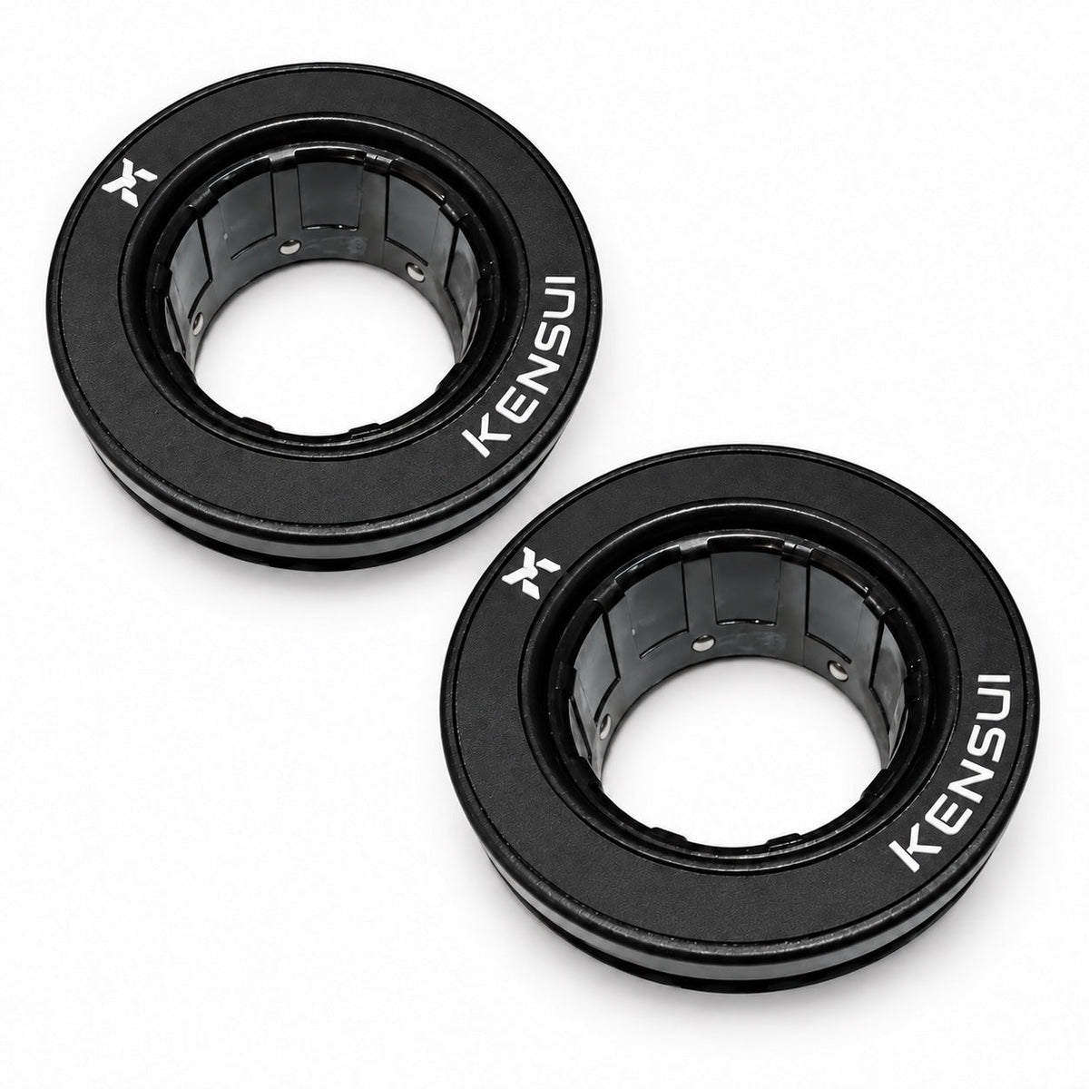 Pair of black Kensui auto-lock Olympic barbell collars with white branding