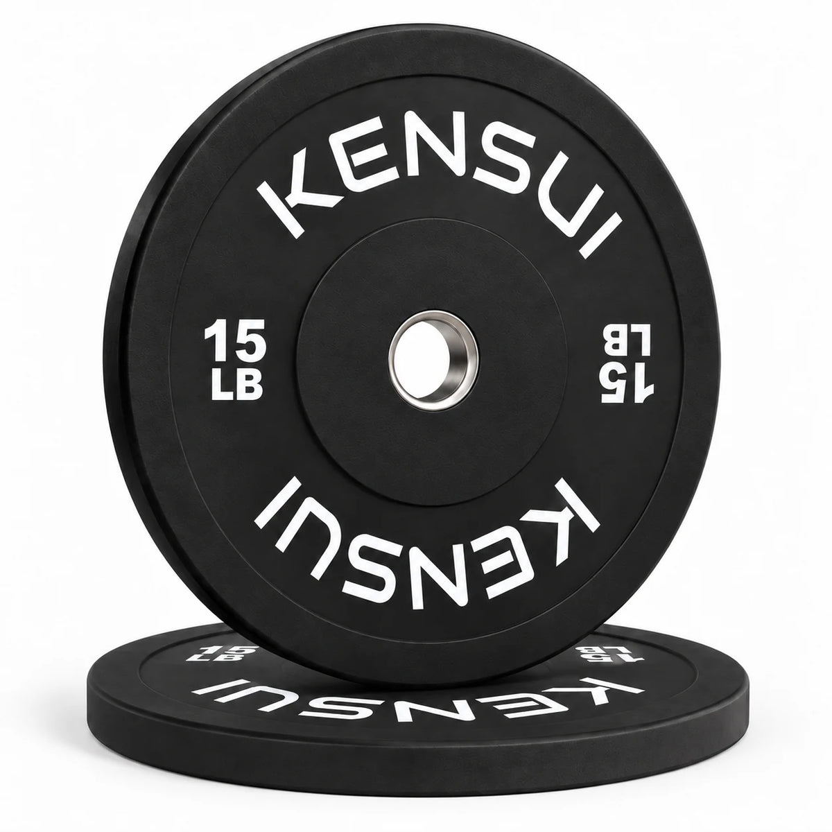 Pair of Kensui 15 lb black bumper plates, one upright on a matching flat plate, with white weight markings and steel inserts.