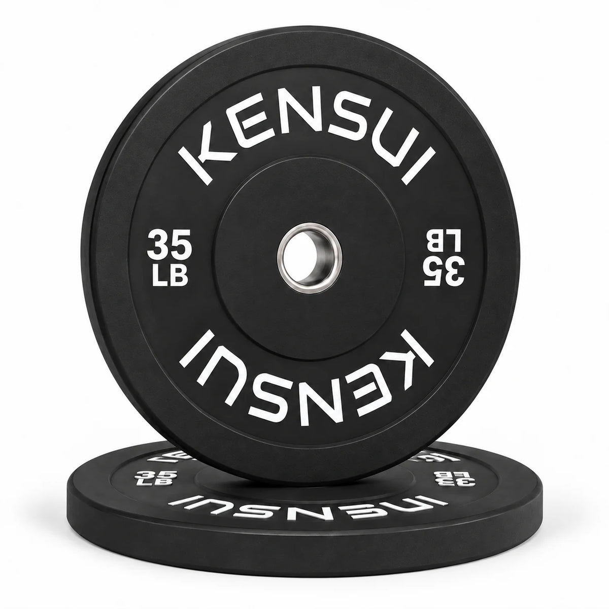 Pair of Kensui 35 lb black bumper plates, one upright on a matching flat plate, with white weight markings and steel inserts.