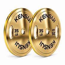 Load image into Gallery viewer, Pair of Kensui 35 LB calibrated grip plates with a polished warm gold finish, black weight markings and yellow rim stripe on white.