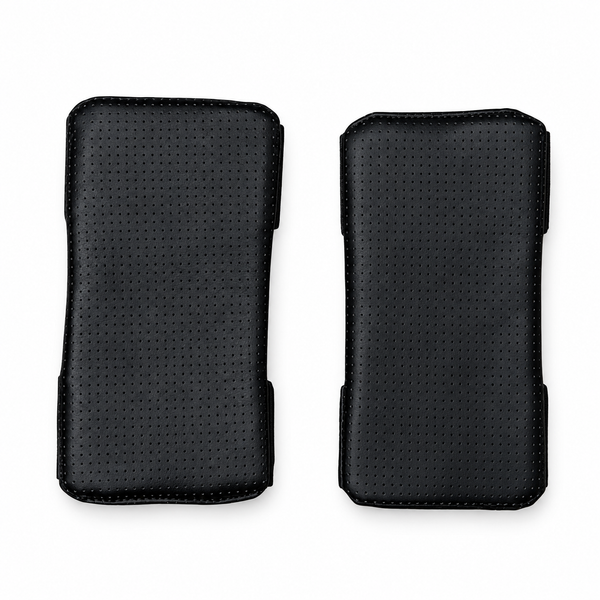 Pair of Kensui EZ-VEST shoulder pads showing the black perforated PU-leather lining on a white background.