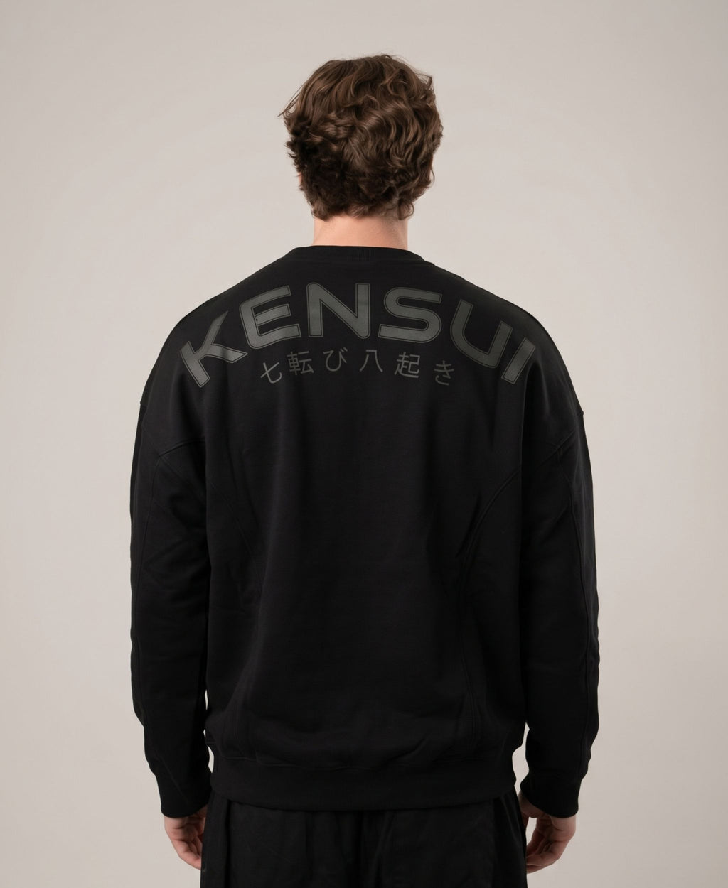 Nanakoribi Crew in black, back view with tonal KENSUI lettering and Japanese print.