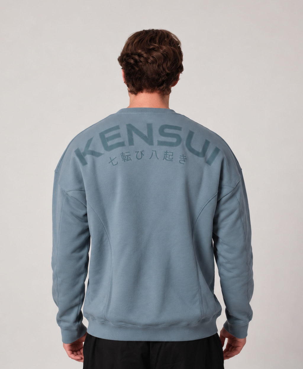 Nanakoribi Crew in blue, back view with KENSUI lettering and Japanese print.