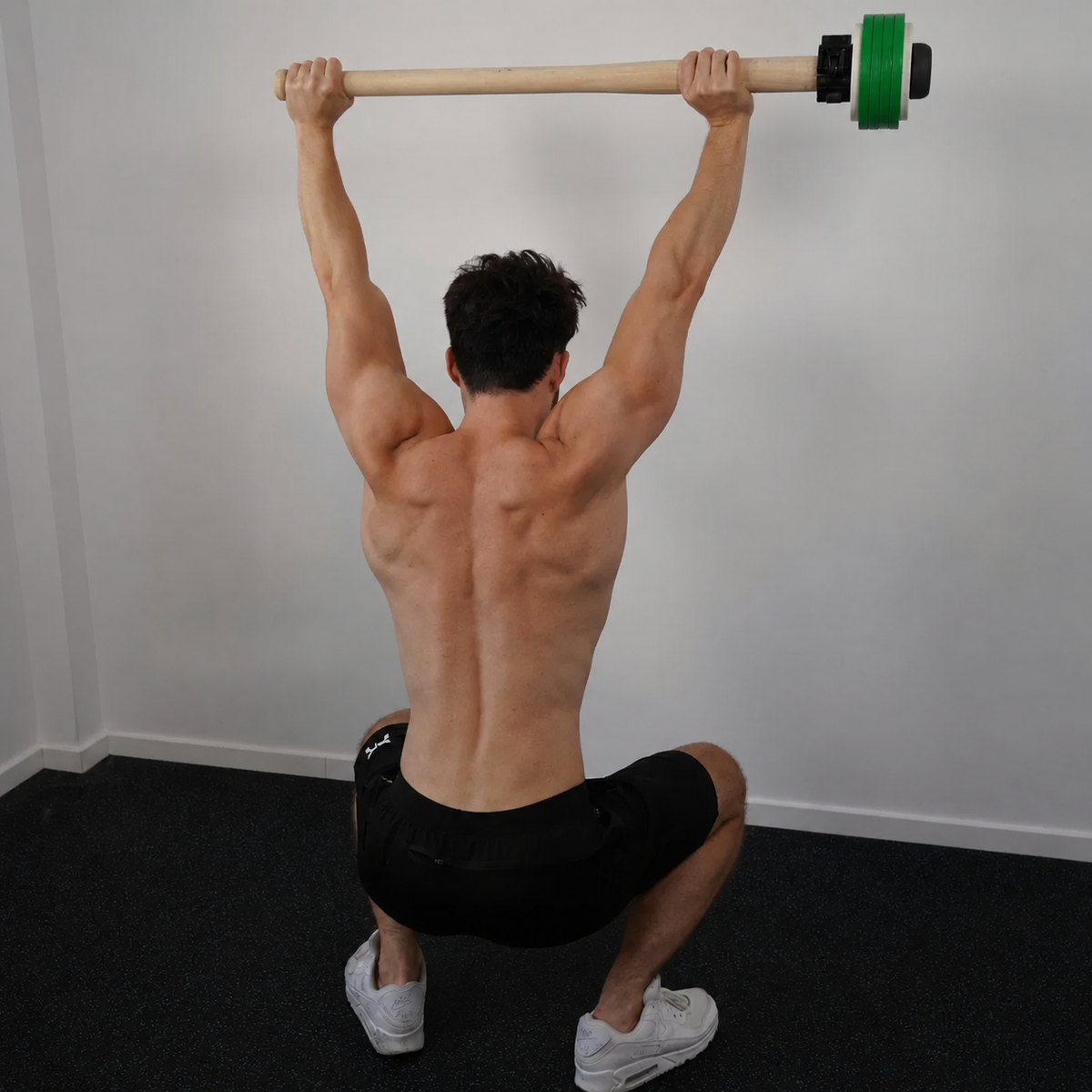 Overhead squat with mace