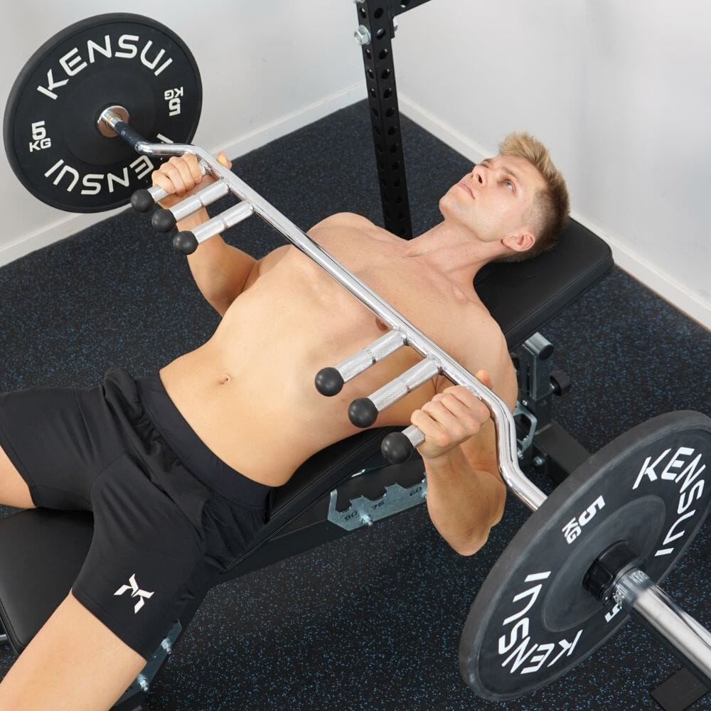 Athlete bench pressing with the Sapporo bar