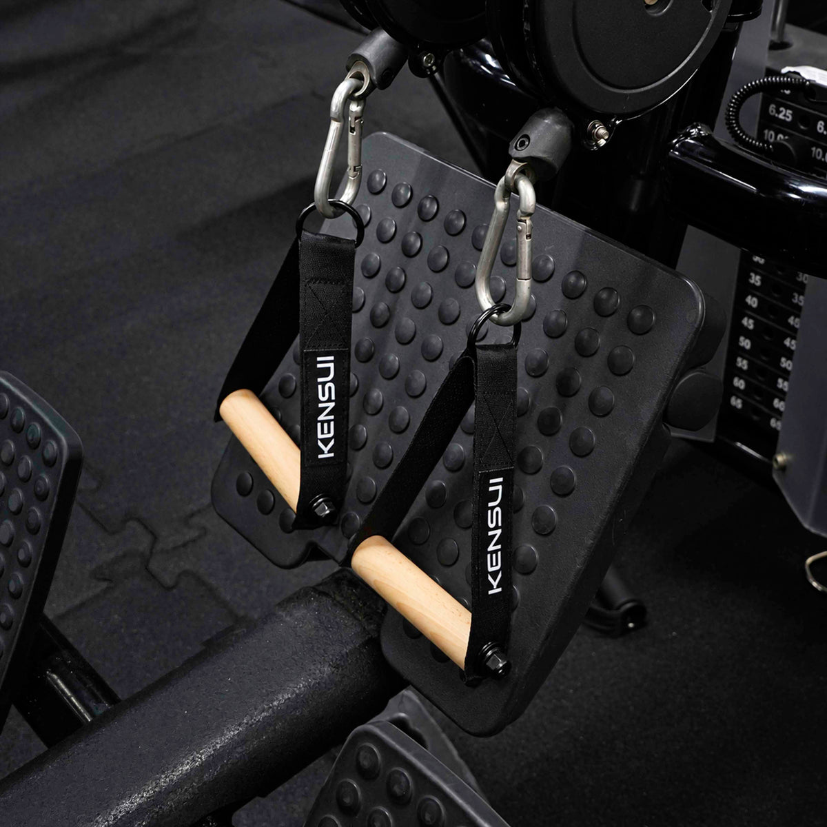 Pair of Kensui Woody Handles attached to a cable rowing machine