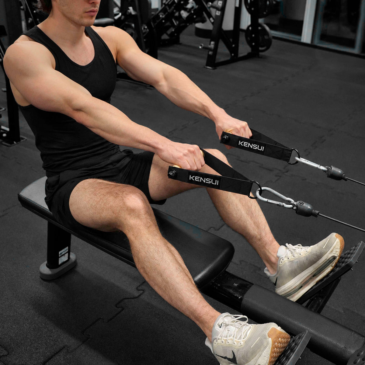 Extended-arm position of a seated cable row with Kensui Woody Handles