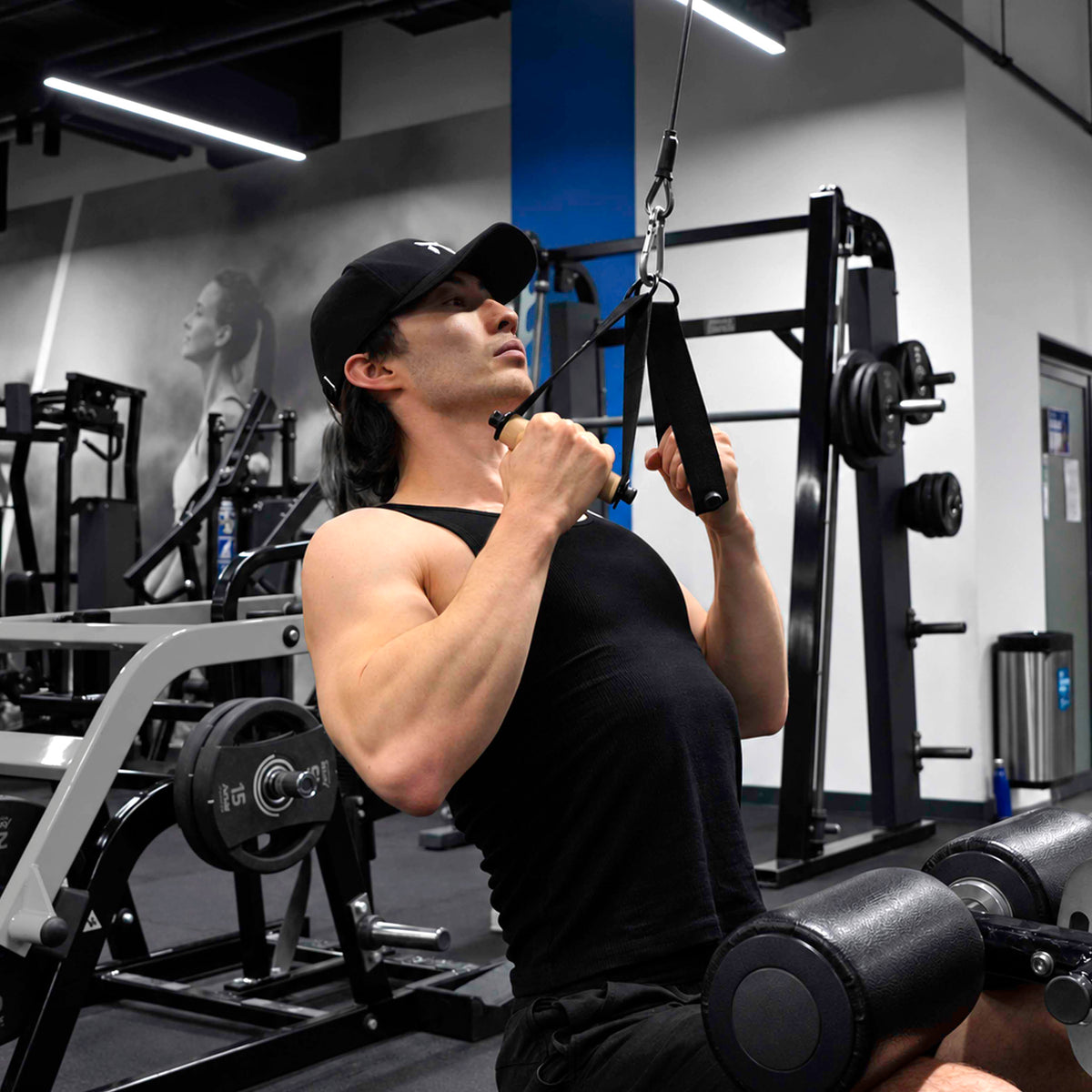 Front view of a seated cable pulldown using Kensui Woody Handles